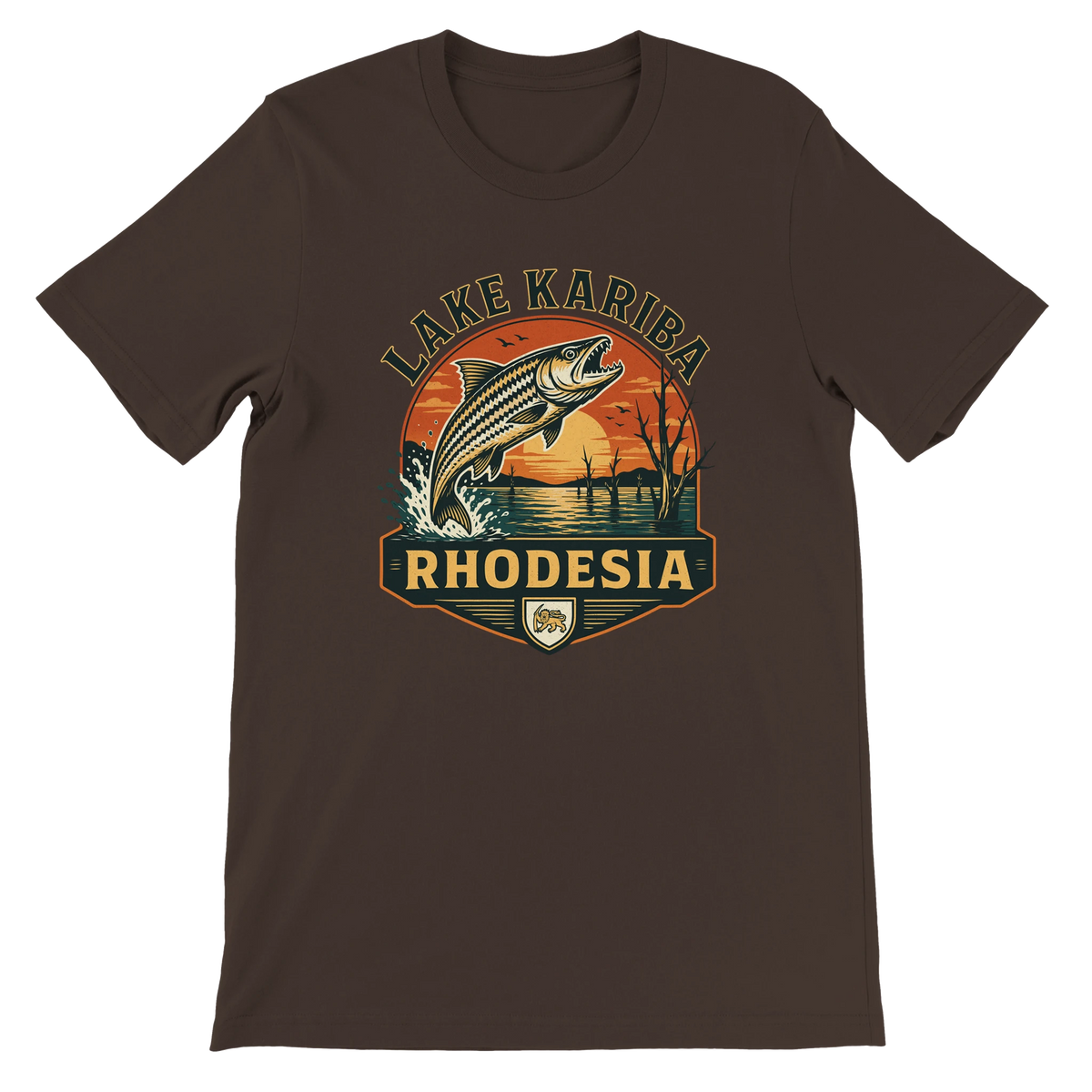 A dark brown short-sleeve crewneck t-shirt featuring a vintage-style graphic of a Tiger fish jumping from Lake Kariba, Rhodesia, with a sunset background.