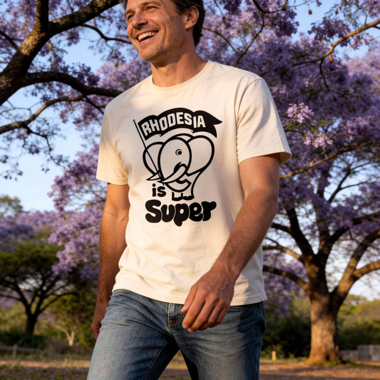 Man wearing a t-shirt with 'Rhodesia is Super' design in a park with Jacaranda trees.